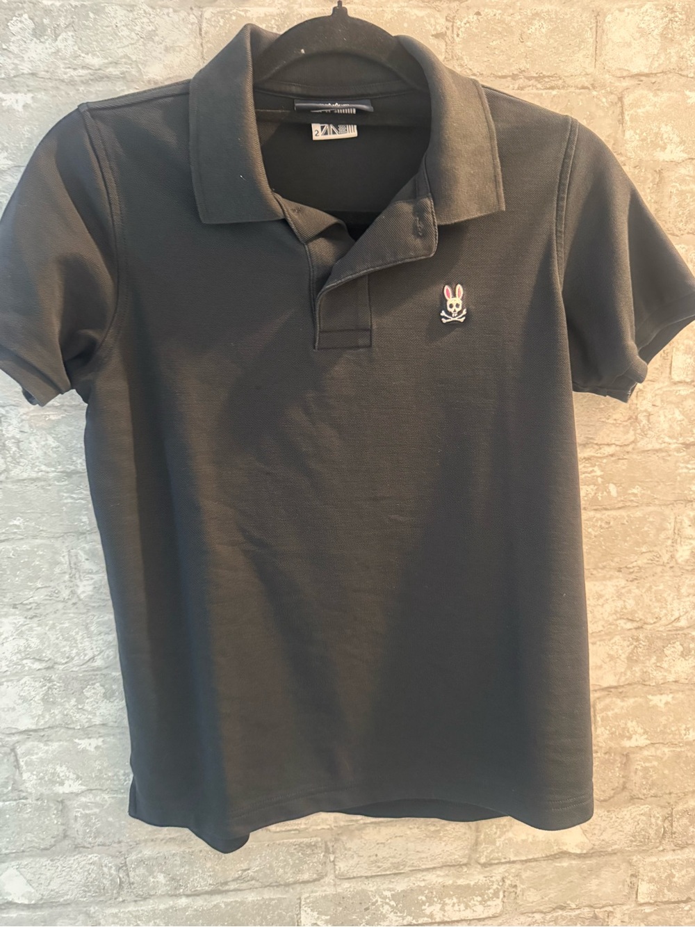 Psycho Bunny Black Polo with Pink & White Bunny Skull Patch